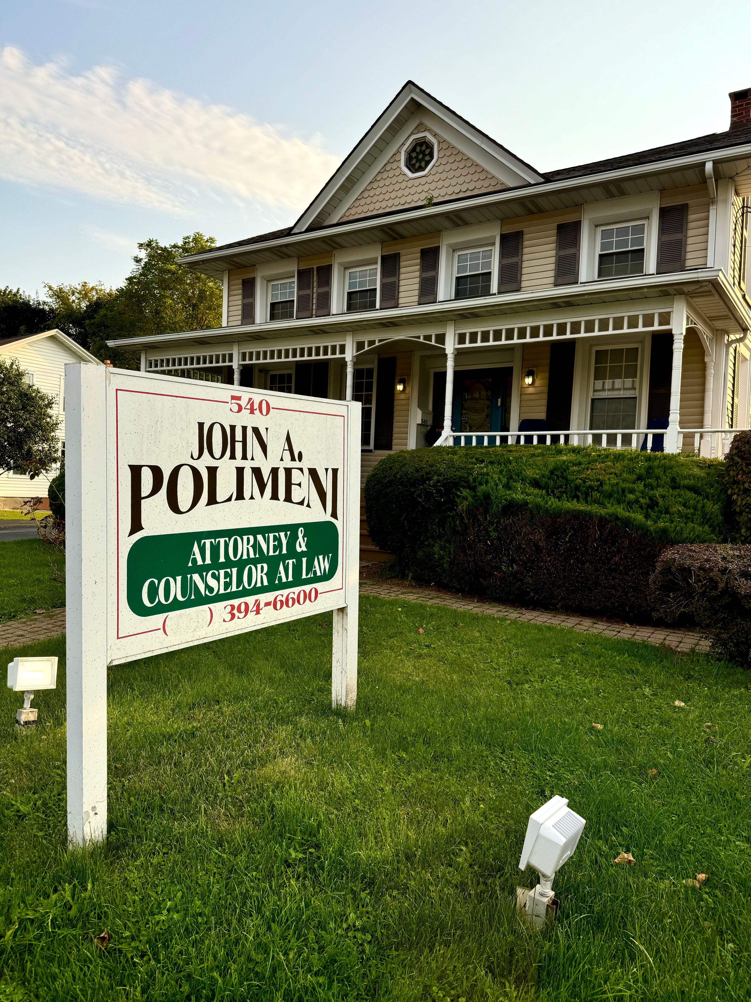 John Polimeni, Attorney at Law & Red Jacket Realty